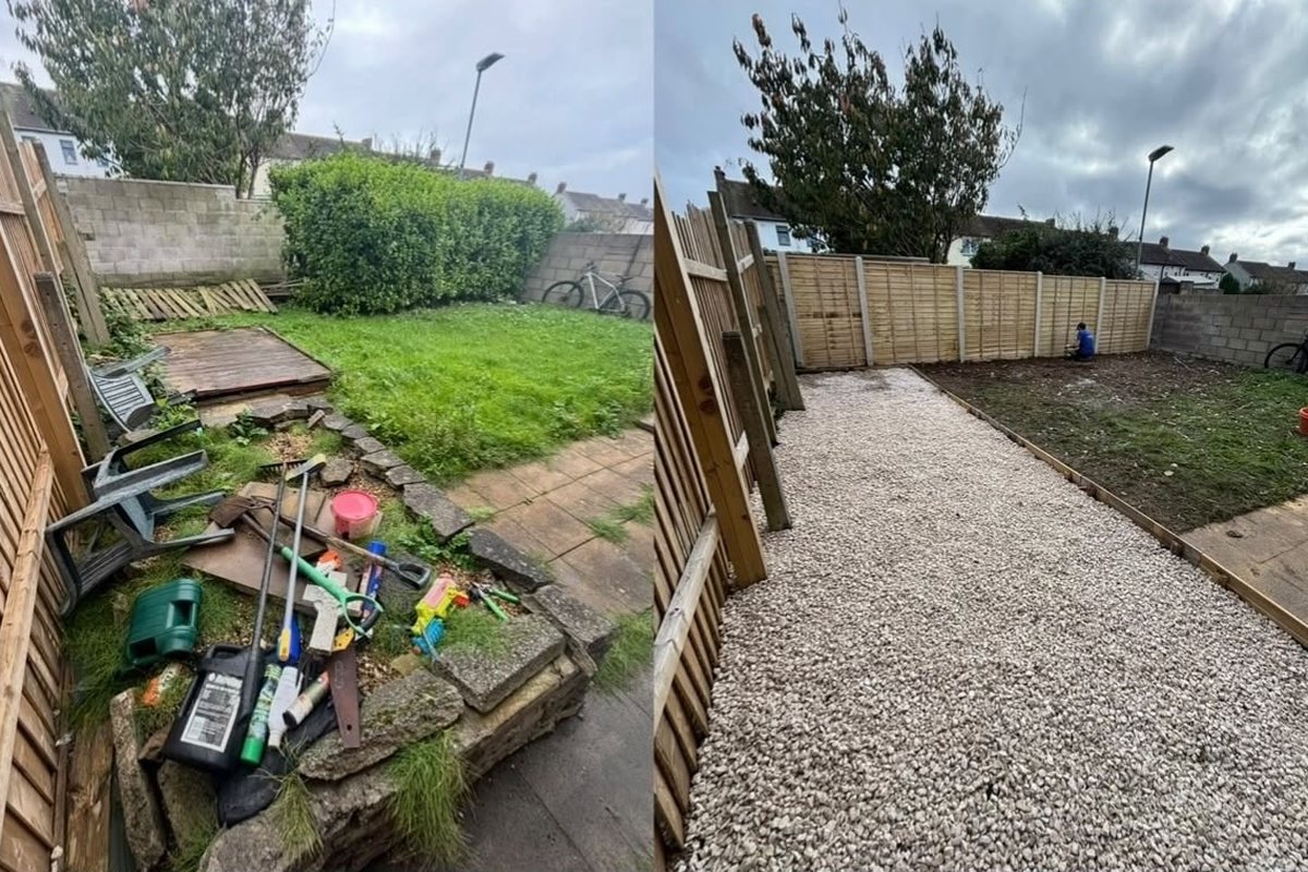 New fencing beside a gravel driveway