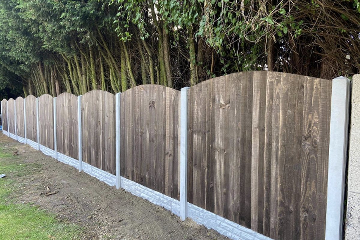 A full run of new fence panels and concrete posts